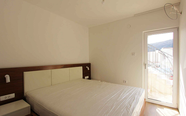 House with 5 separate apartments in Becici with sea view — photo 14